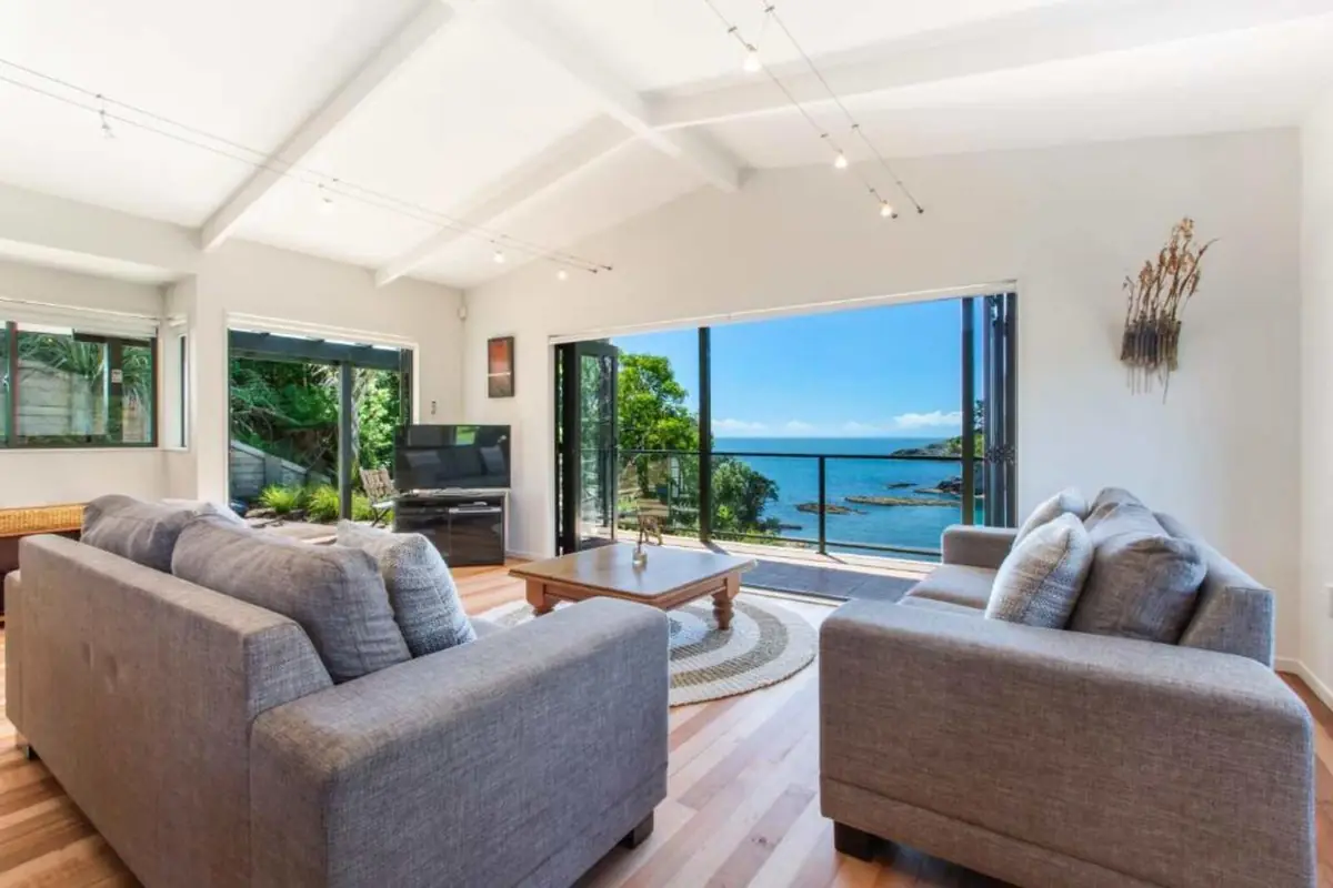 Lounge opening onto the deck above Enclosure Bay